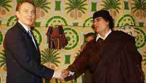 Tony Blair and Colonel Qadafi, libya shake hands